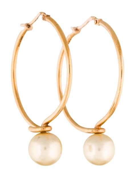 celine pearl hoop earrings|authentic celine earrings.